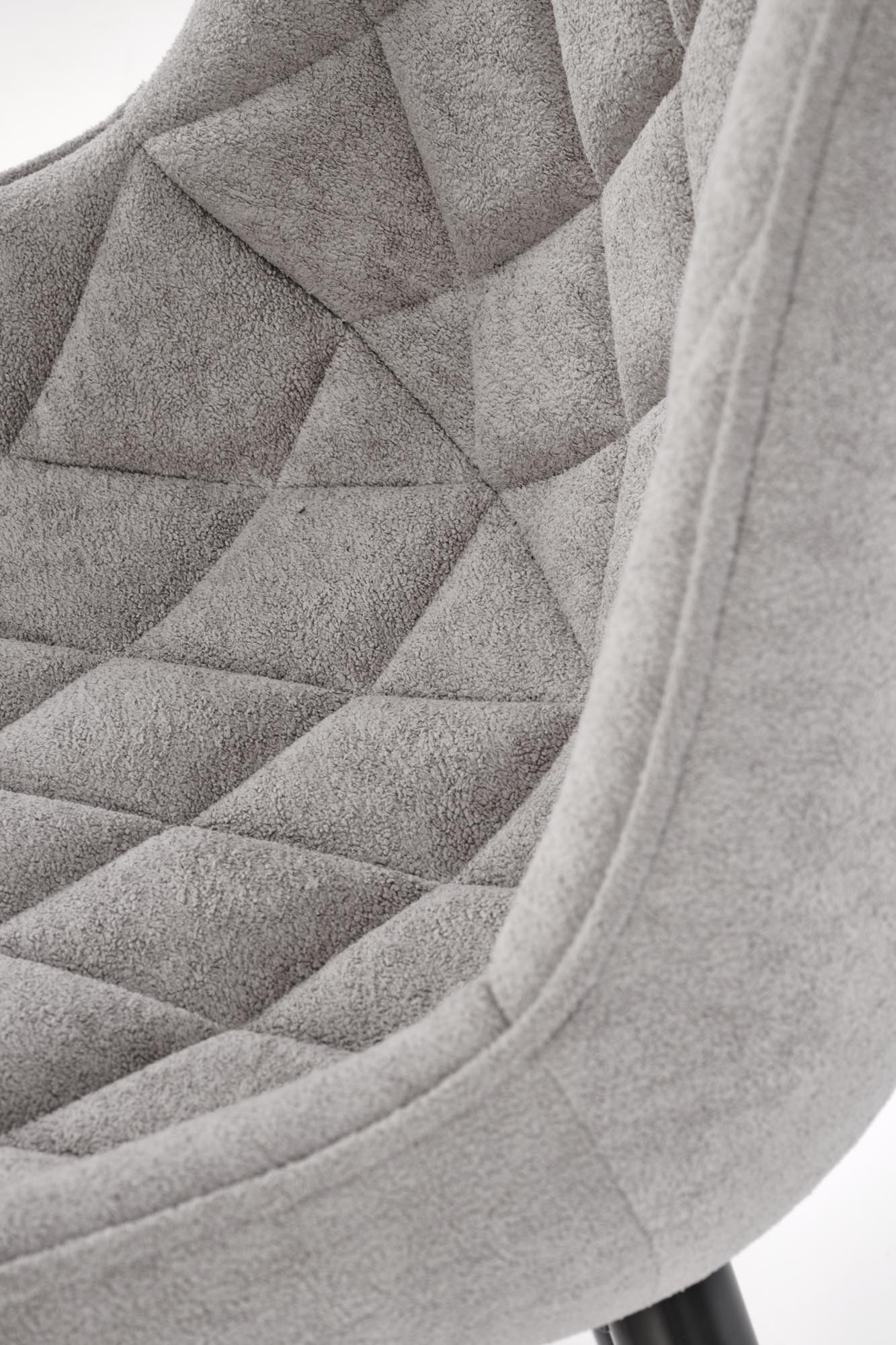 Krzesło MILAN – nowoczesne tapicerowane krzesło w eleganckim popielatym odcieniu z detalami tkaniny.